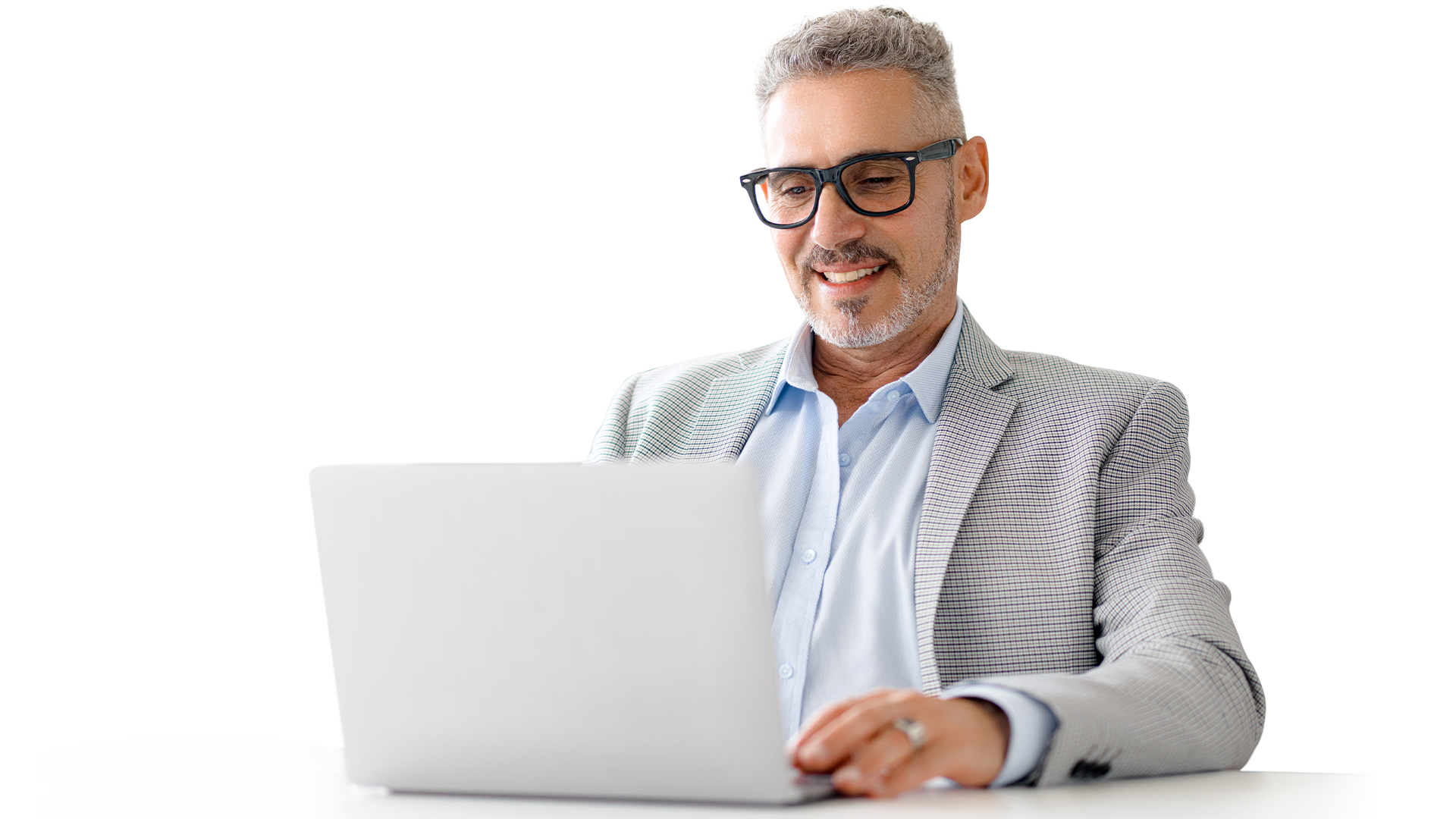 Smiling executive using a laptop